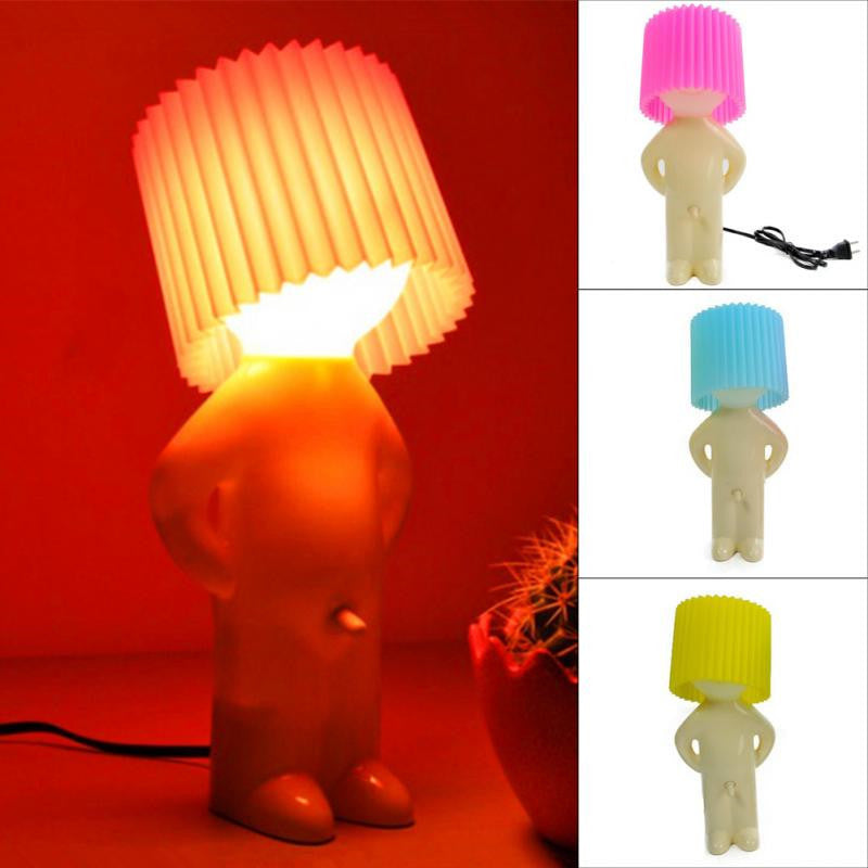 Person-shaped lamp with colorful lampshades on a red background