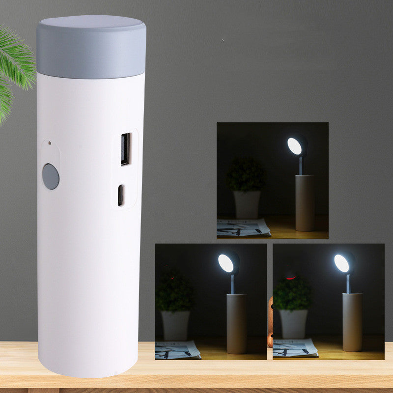 White cylindrical lamp with gray top on a wooden surface, with inset images showing its use.