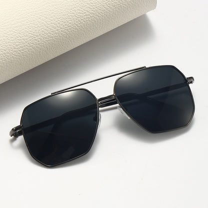 A pair of aviator style sunglasses with a double beam design, featuring dark lenses and a metallic frame.