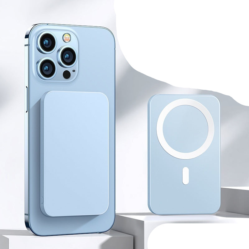 Smartphone with a magnetic power bank attachment on a light gray background