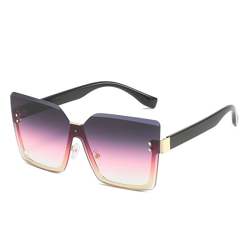 Sunglasses with gradient lenses on a white background