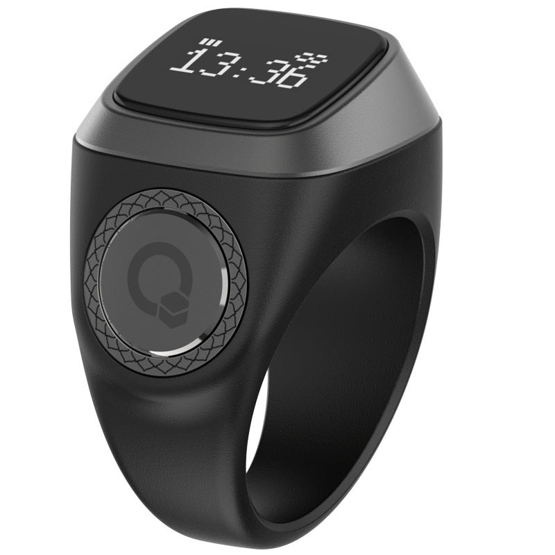 Black digital ring with a display on a white background