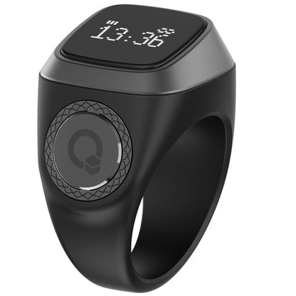 Black digital ring with a display on a white background