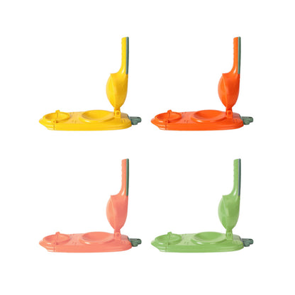 Set of four colorful plastic toys resembling vacuum cleaners on a white background