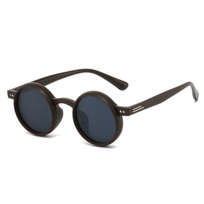 Round sunglasses with dark lenses on a white background, labeled 'COFFEE'.