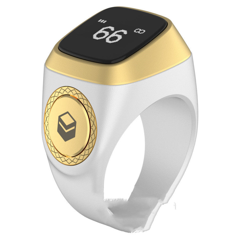 Smart ring with digital display and gold accents on a white background