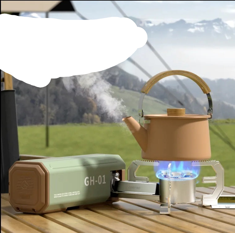 Portable stove with a teapot on a wooden surface outdoors