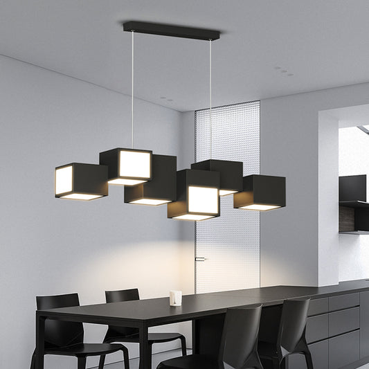 A modern black ceiling-mounted pendant light with multiple square-shaped灯heads hanging over a dining table in a contemporary room setting.