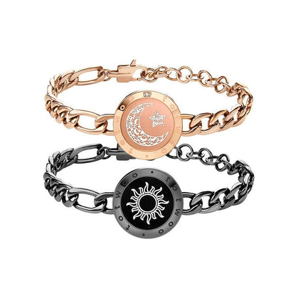 Two chain bracelets with circular emblem designs on a white background