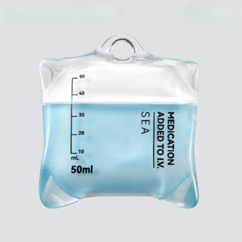 Clear bag with blue liquid and measurement markings on a light gray background