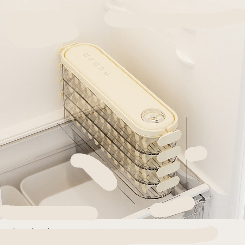 Dumpling-making machine with clear acrylic lid on a white background