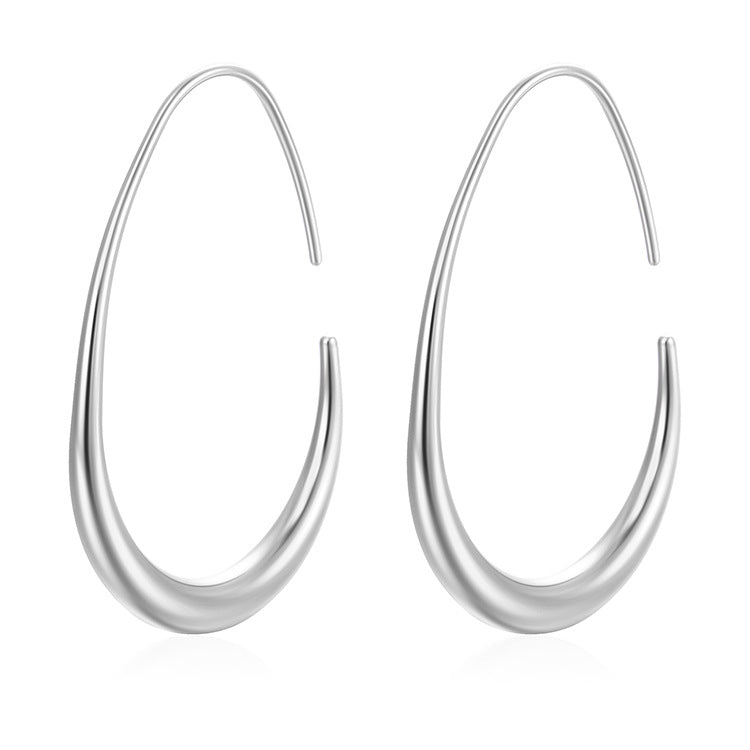 Pair of silver hoop earrings on a white background