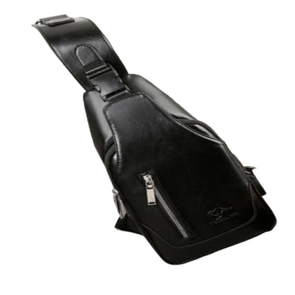 Black leather sling bag on a light gray surface with headphones nearby