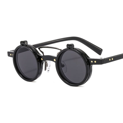 Black round sunglasses with metallic accents on a white background