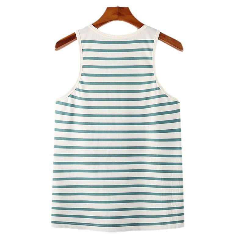 Striped dress with green and white horizontal stripes on a wooden hanger against a white background