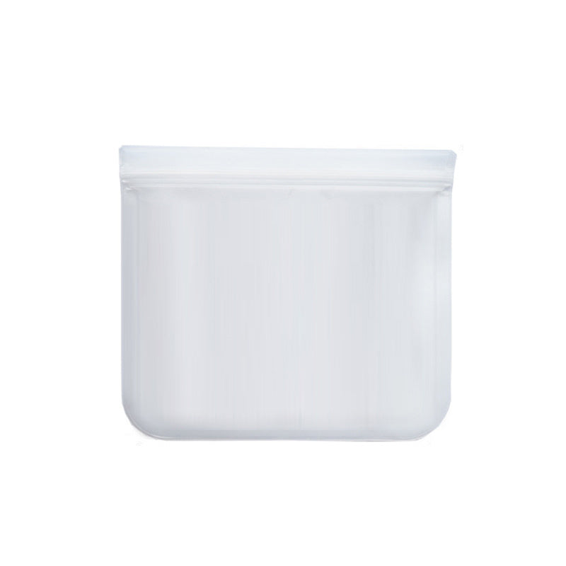 Clear plastic food storage bags of various sizes containing food items, placed in a refrigerator.