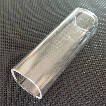 Clear plastic tube on a textured black background