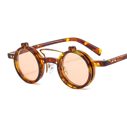 Round tortoiseshell sunglasses with amber lenses on a white background