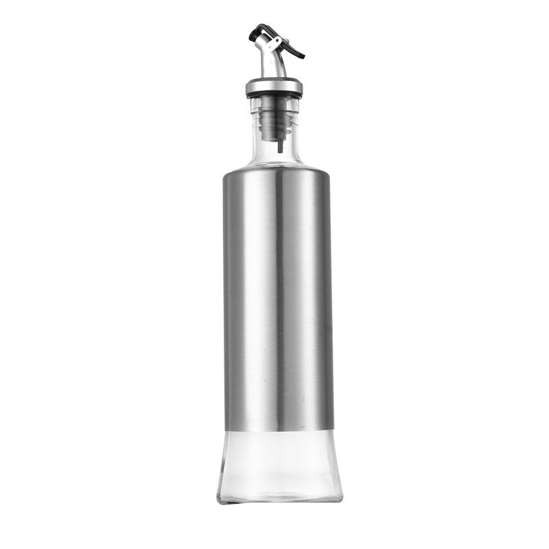 Silver oil bottle with measurements on a white background