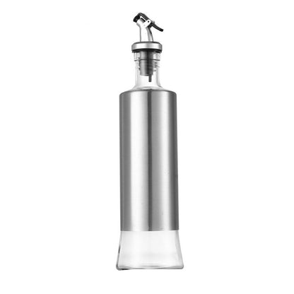 Silver oil bottle with measurements on a white background