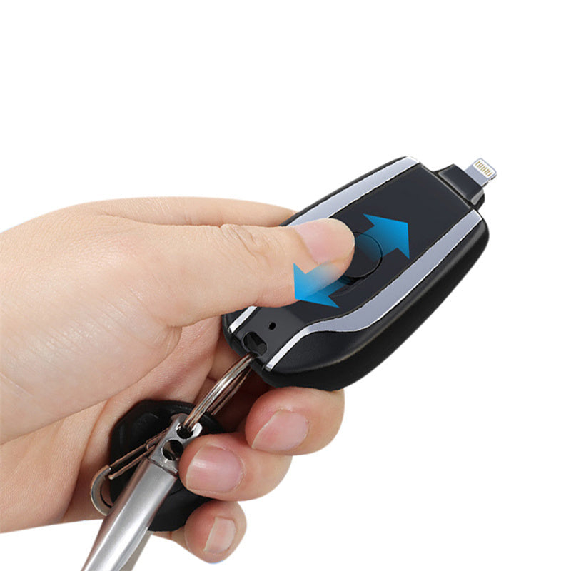 Telescopic plug design with a hand holding it, on a white background