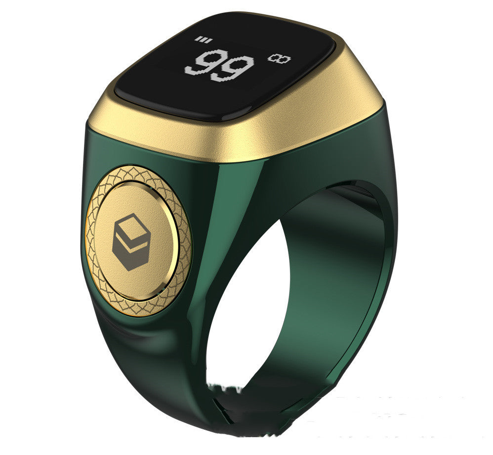 Green and gold smart ring with digital display on a white background