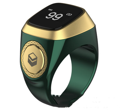Green and gold smart ring with digital display on a white background