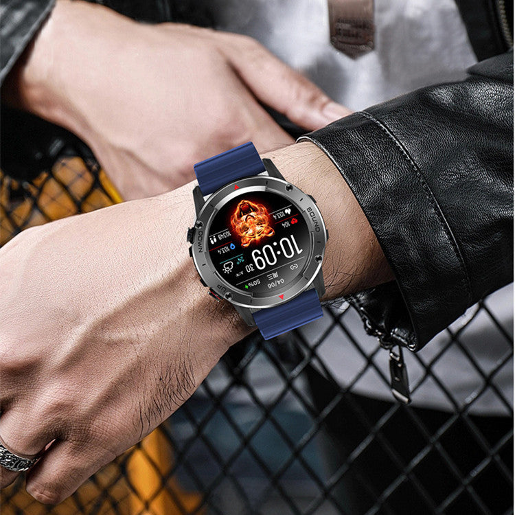 Smartwatch with a blue strap on a wrist, displayed against a blurred background.
