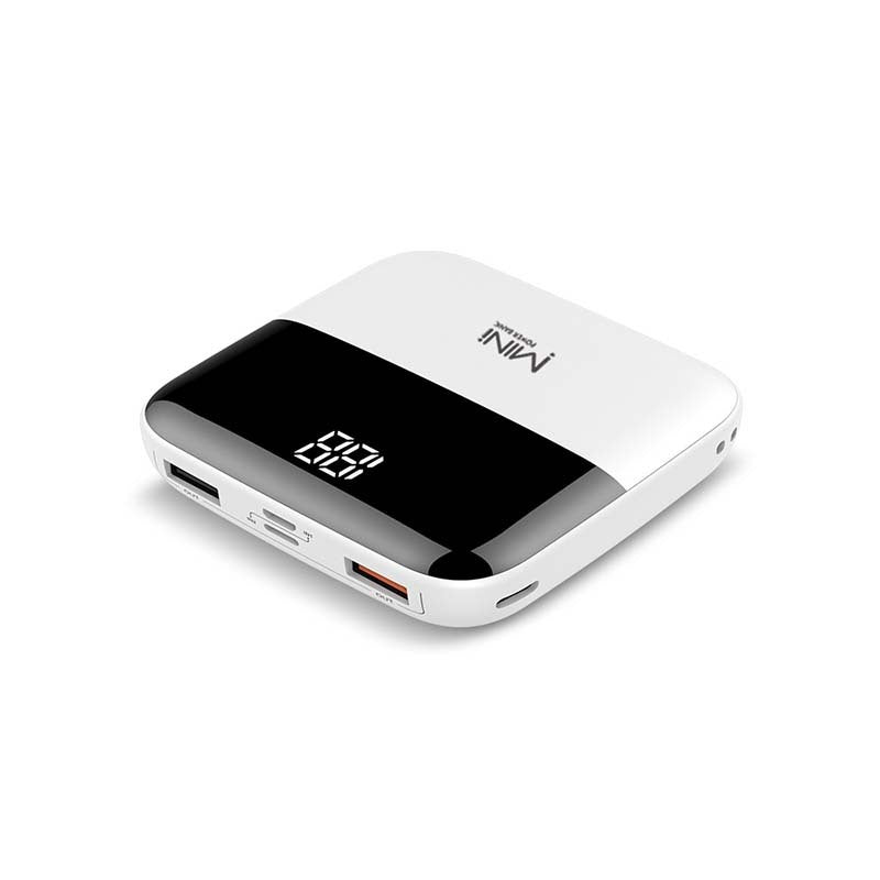 White power bank with digital display on a white background