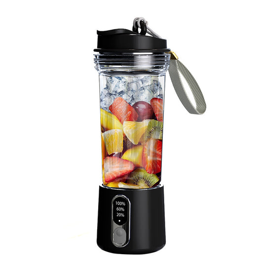 Portable blender with fruits and ice inside on a white background
