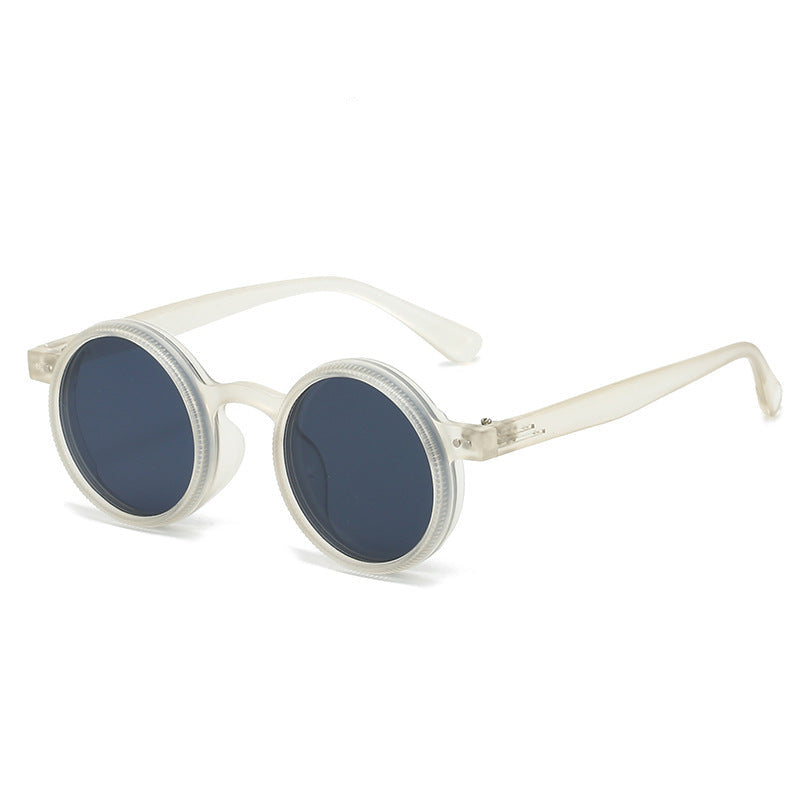Transparent sunglasses with dark lenses on a white background