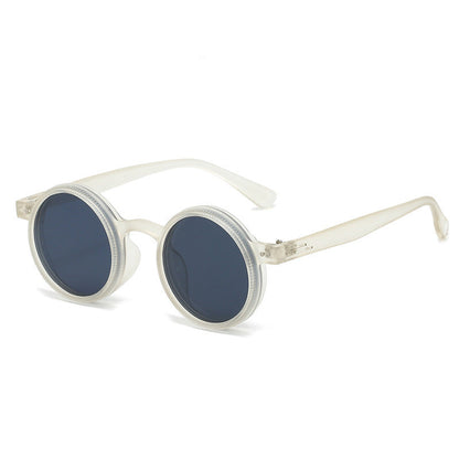 Transparent sunglasses with dark lenses on a white background