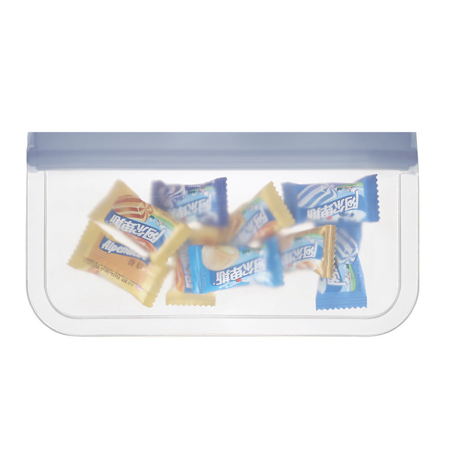 Clear pouch with colorful packages of Nestle Tollhouse chocolate chips on a white background