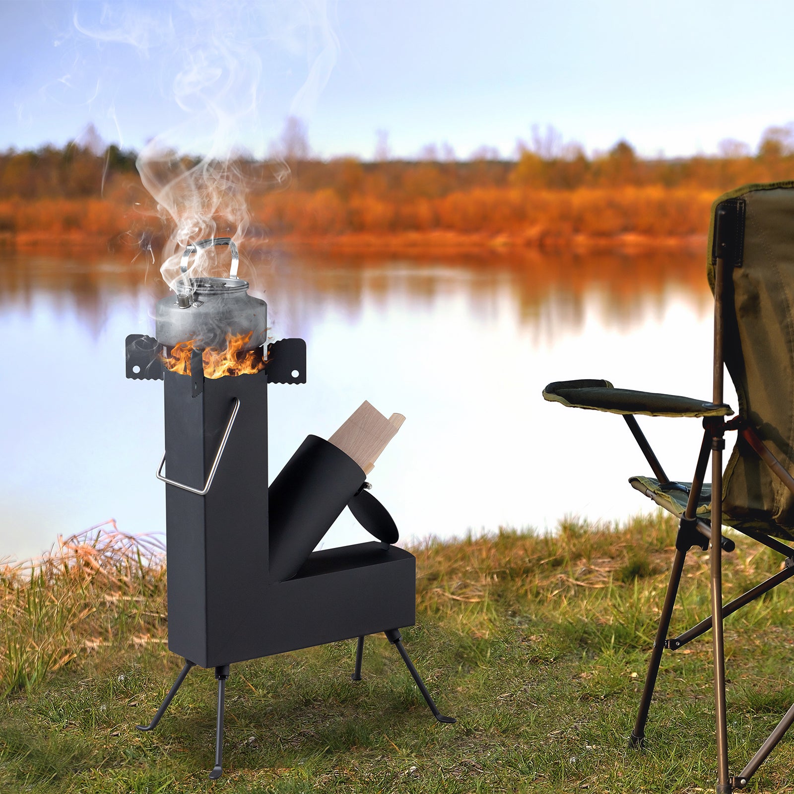 Portable stove with fire burning next to a chair by a lake