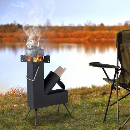 Portable stove with fire burning next to a chair by a lake