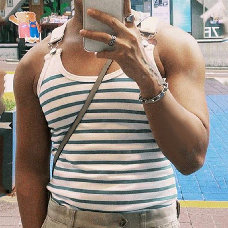 Person wearing a striped tank top taking a mirror selfie.