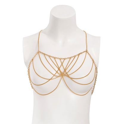 Gold chainmaille top on a mannequin against a white background