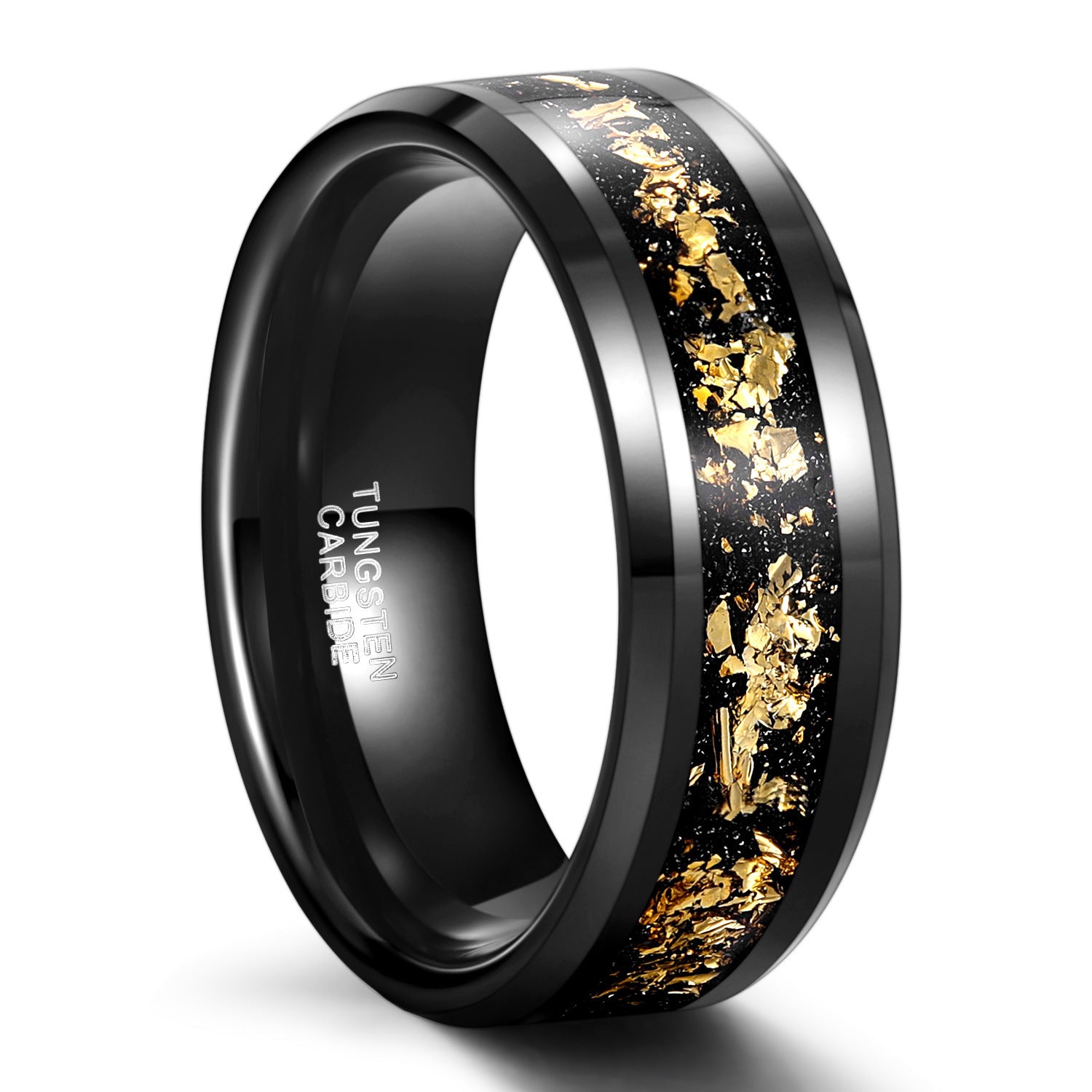 Black tungsten ring with gold inlay on a white background