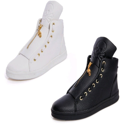 White and black high-top sneakers with gold zippers on a white background