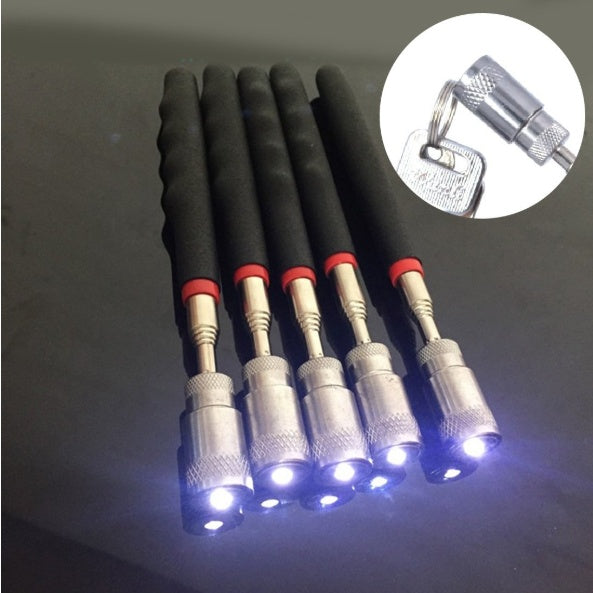 Set of five LED screwdrivers with keychain attachment on a dark background