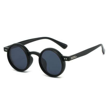 Black round sunglasses on a white background with 'BLACK' text above.