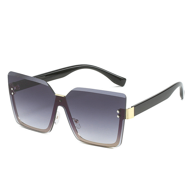 Sunglasses with gradient lenses and black frame on a white background