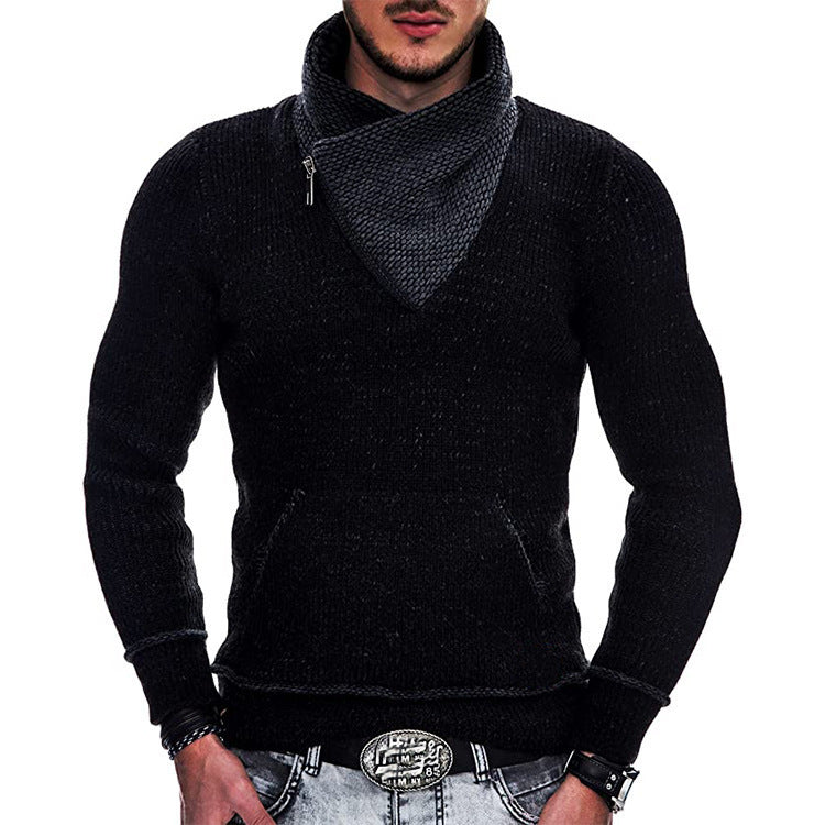 Black sweater worn by a person on a white background
