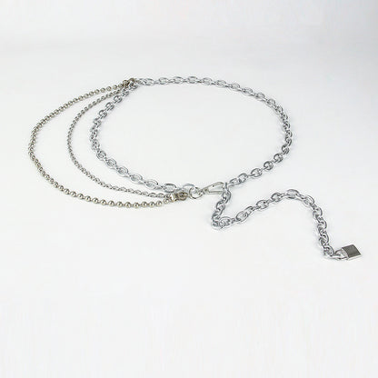 Silver chain necklace on a white background