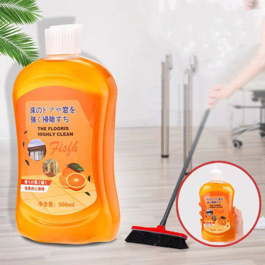 Orange cleaning bottle with a broom and mop in the background