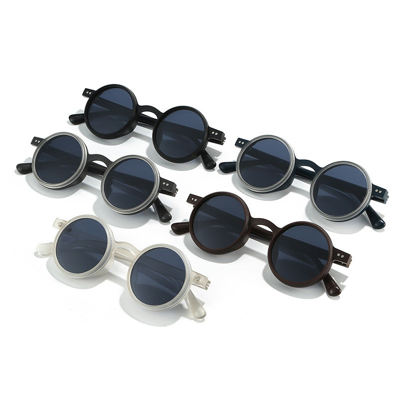 Set of round sunglasses in black and white on a white background