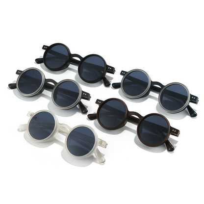 Set of round sunglasses in black and white on a white background