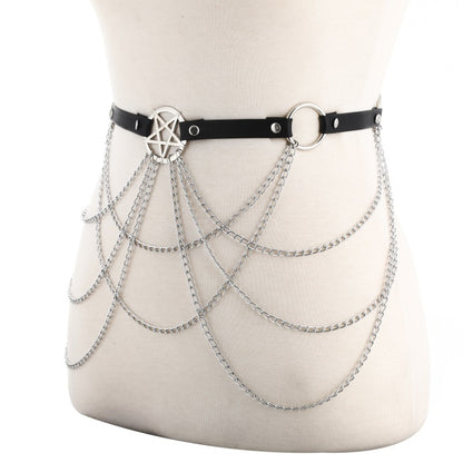Silver chain belt with black leather strap and pentagram design on mannequin.