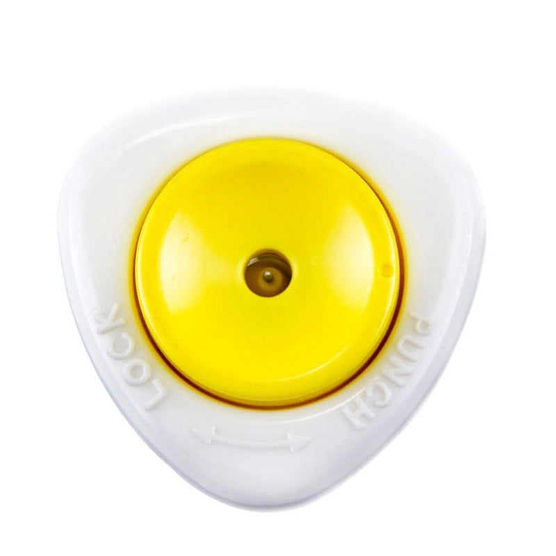 Yellow button with white casing on a white background