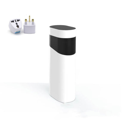 White cylindrical device with black top on a white background, with UK plug adapter on the left.